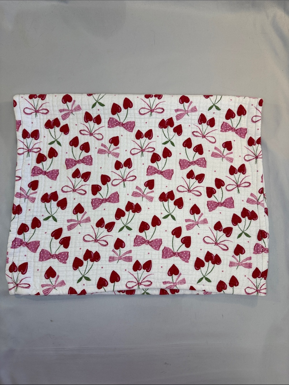 Nicole Miller Kitchen tea towel with Red Cherry and Pink Bow Print